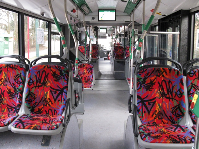 Articulated trolleybus no. 054 of the Polish type Solaris Trollino 18 AC - back interior view