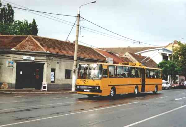 Former Eberswalde articulated trolleybus no. 020 of the Hungarian type Ikarus 280.93 in Timisoara/RO with the car no. 12 on 31 May 2001